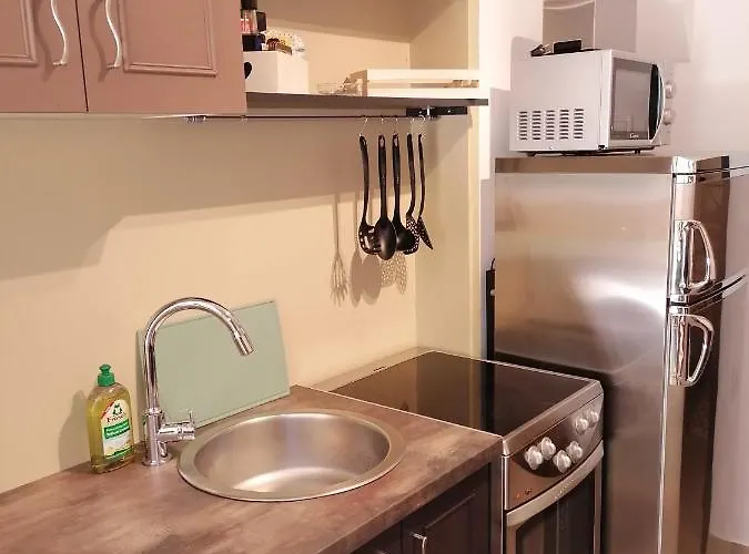 Gostinjska kuća Slim I Sobe